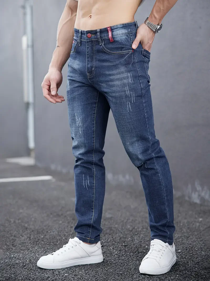 Savage Cut men's tapered blue jeans, comfortable & stylish for a versatile everyday look.