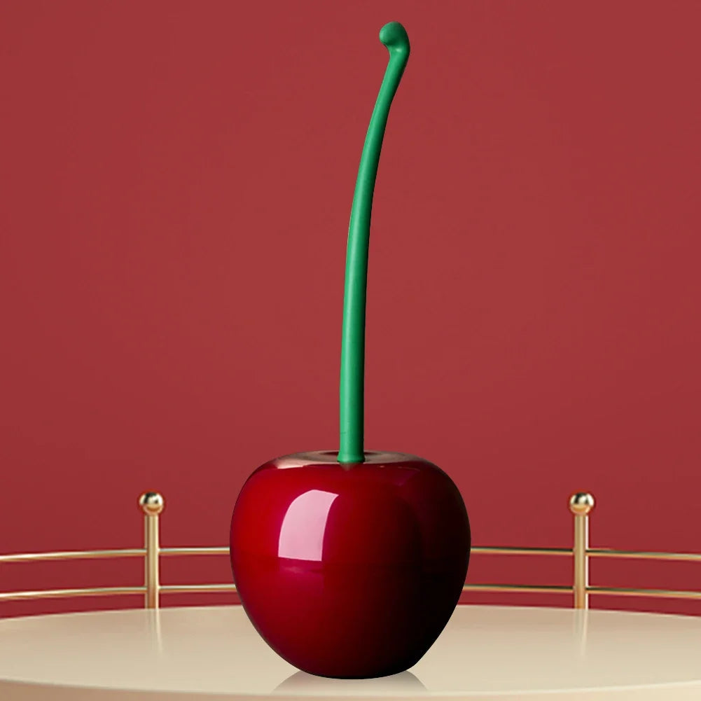 Fun Cherry Bomb toilet brush: a red & black bathroom cleaning tool for scrubbing and maintaining a fresh, hygienic home.