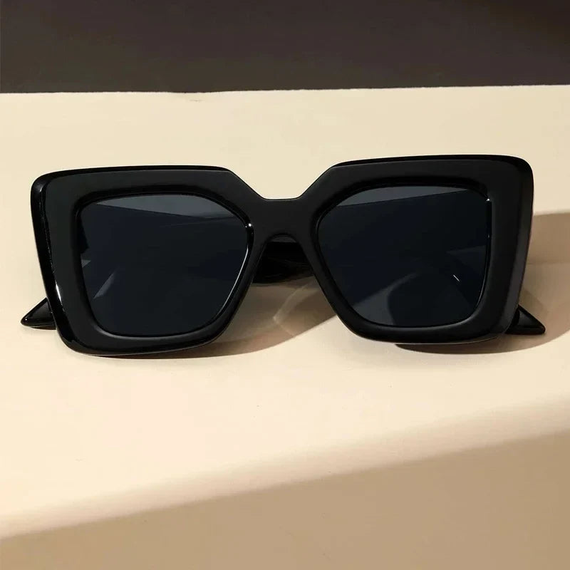Modern black Valencia Classic unisex sunglasses, combining a stylish geometric frame with effective UV protection.
