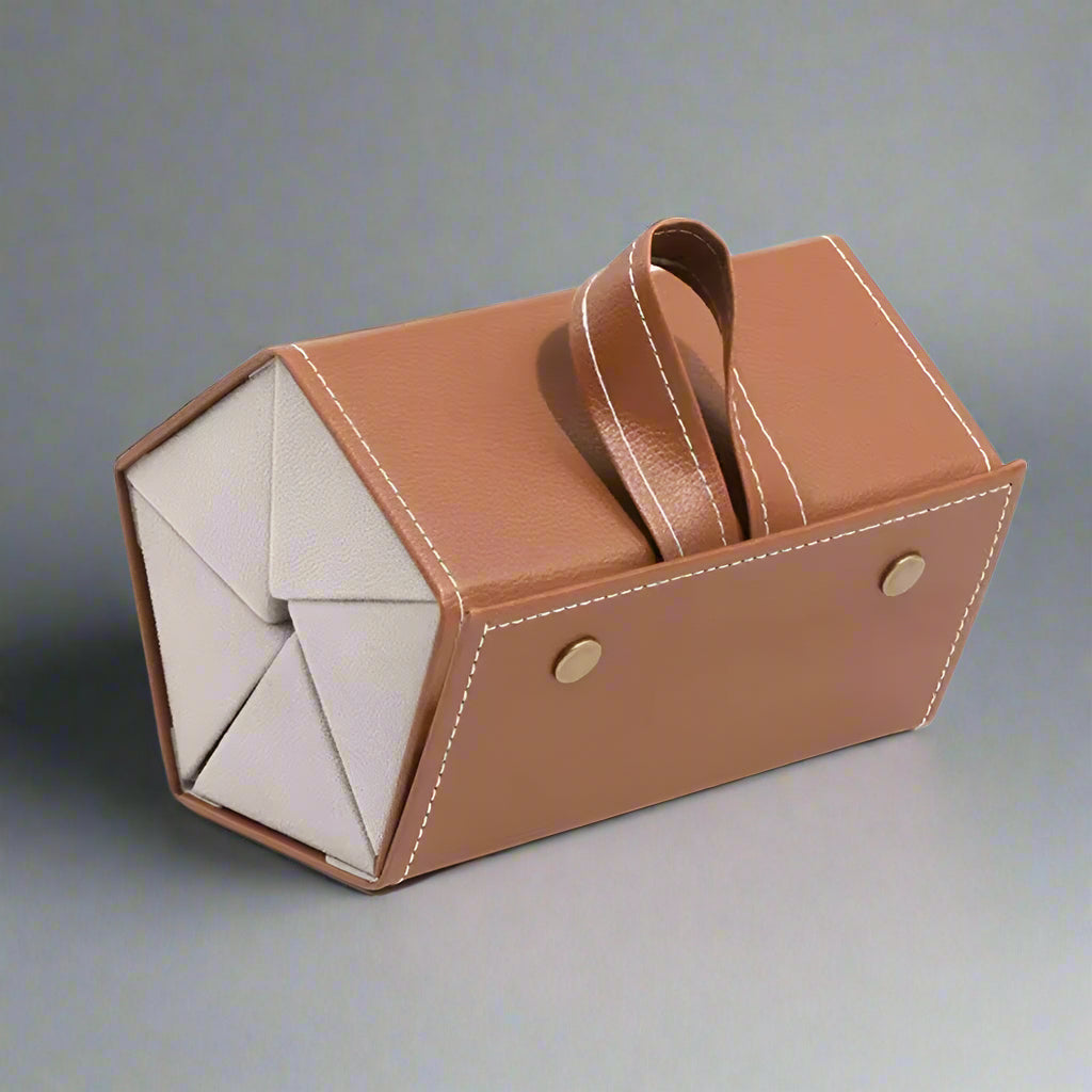 Front view of a sleek black leather multi-slot roll-up glasses case, ideal for secure eyewear storage.
