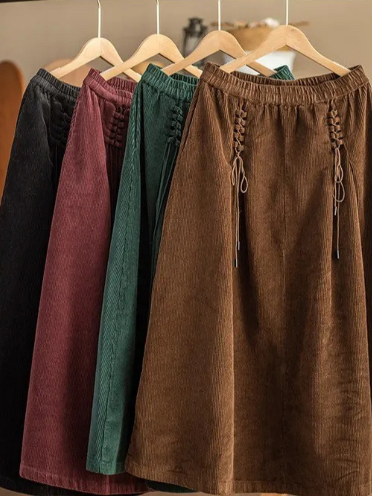 Women's elegant A-line maxi skirt with corset detail, perfect for fashion-forward casual or occasion wear.
