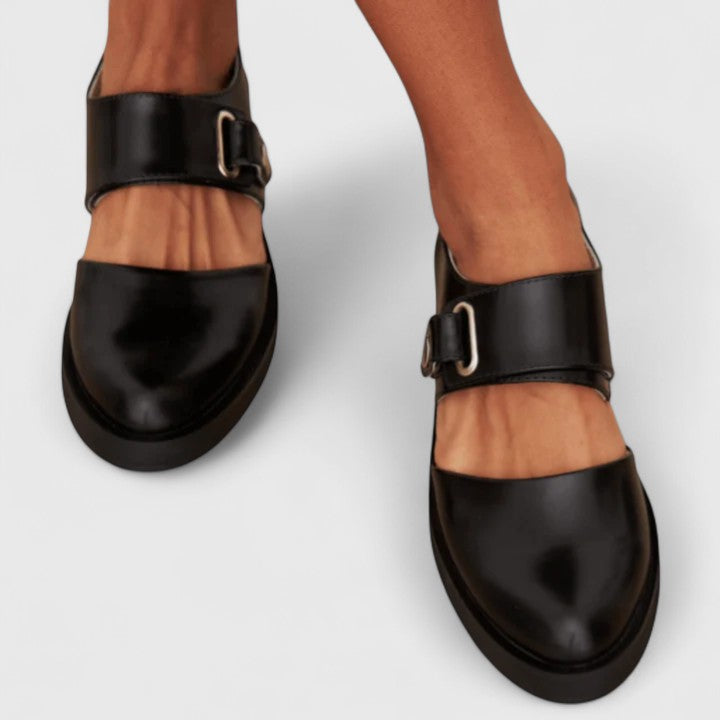 Versatile women's black low heel pumps. Chic classic style for comfort & elegance in formal or everyday outfits.