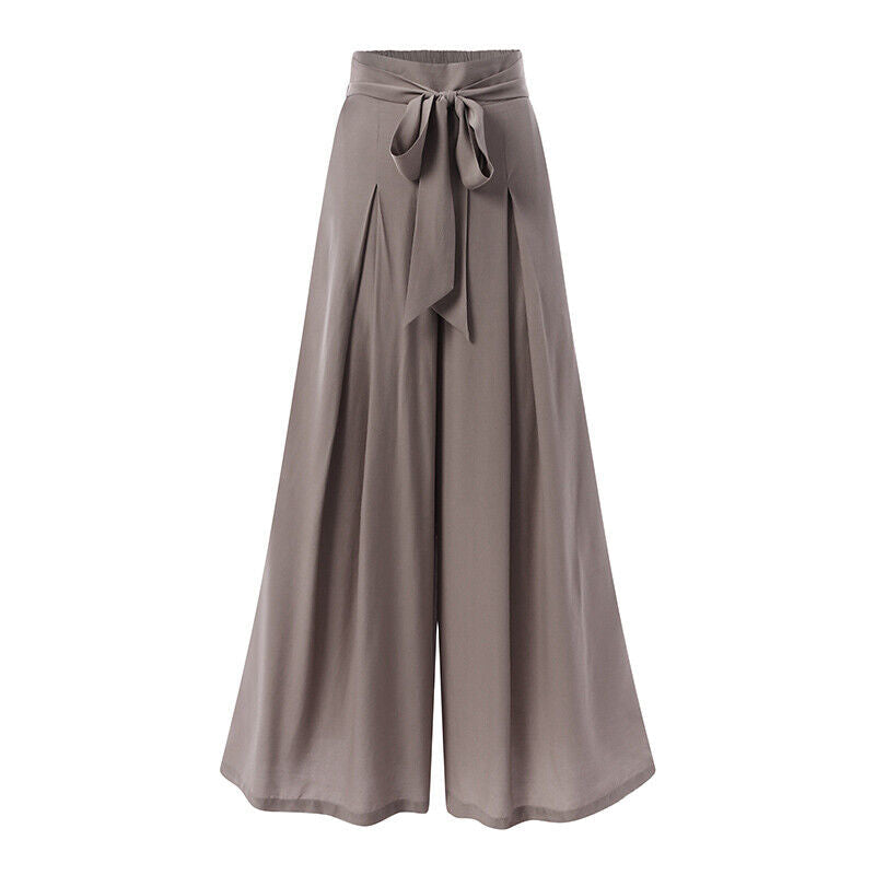 Neatly folded plus-size wide-leg formal trousers, emphasizing quality & comfort.
