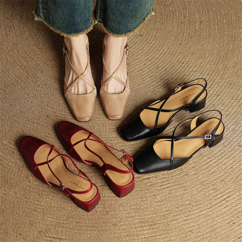 Full shot of women's elegant block heels, featuring a comfortable closed toe and adjustable strap.