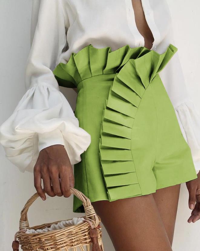 Trendy women's casual high-waist shorts with elegant ruffles, a stylish summer fashion piece.