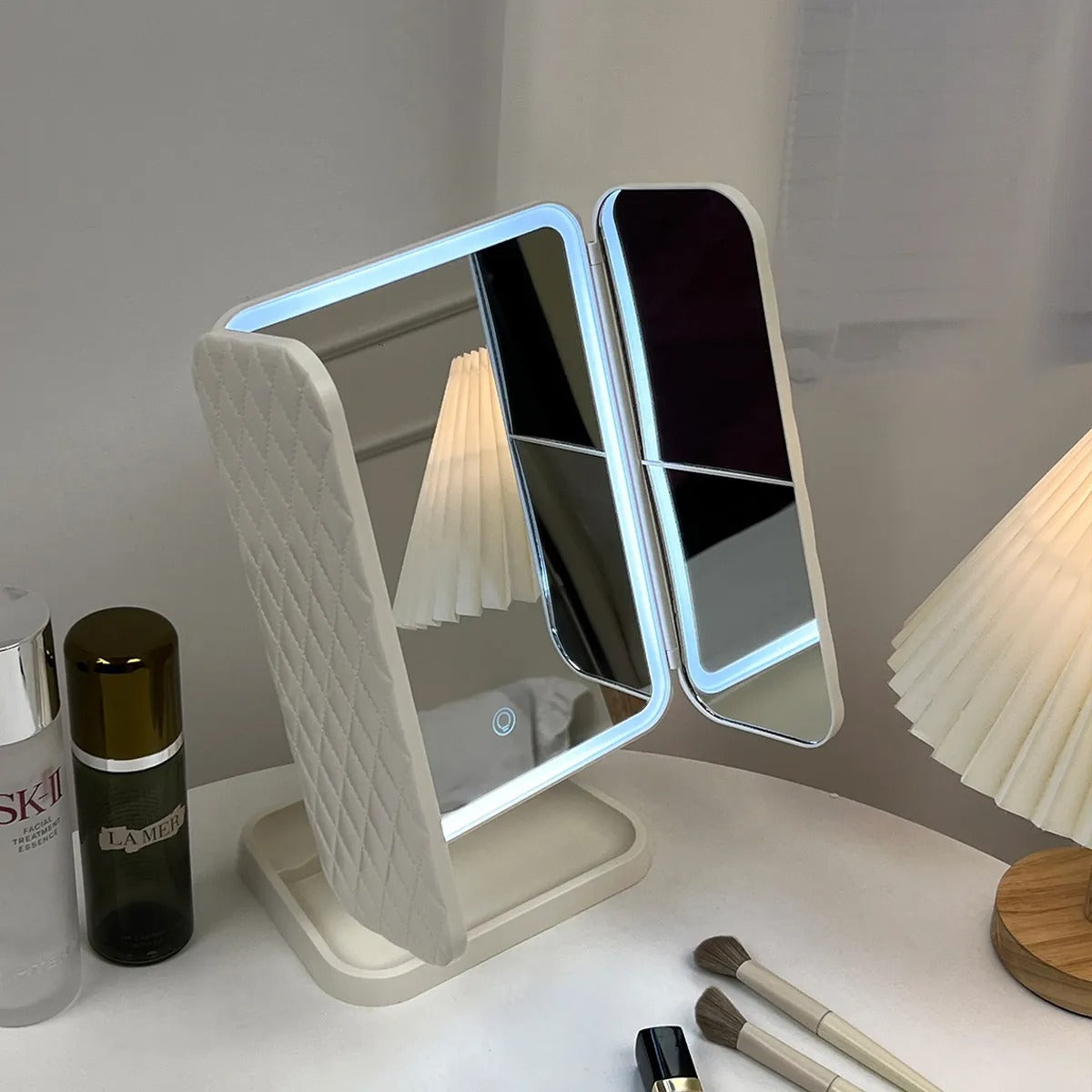 Experience precise makeup with the Glamlit trifold LED vanity mirror, offering bright, portable, and adjustable lighting.