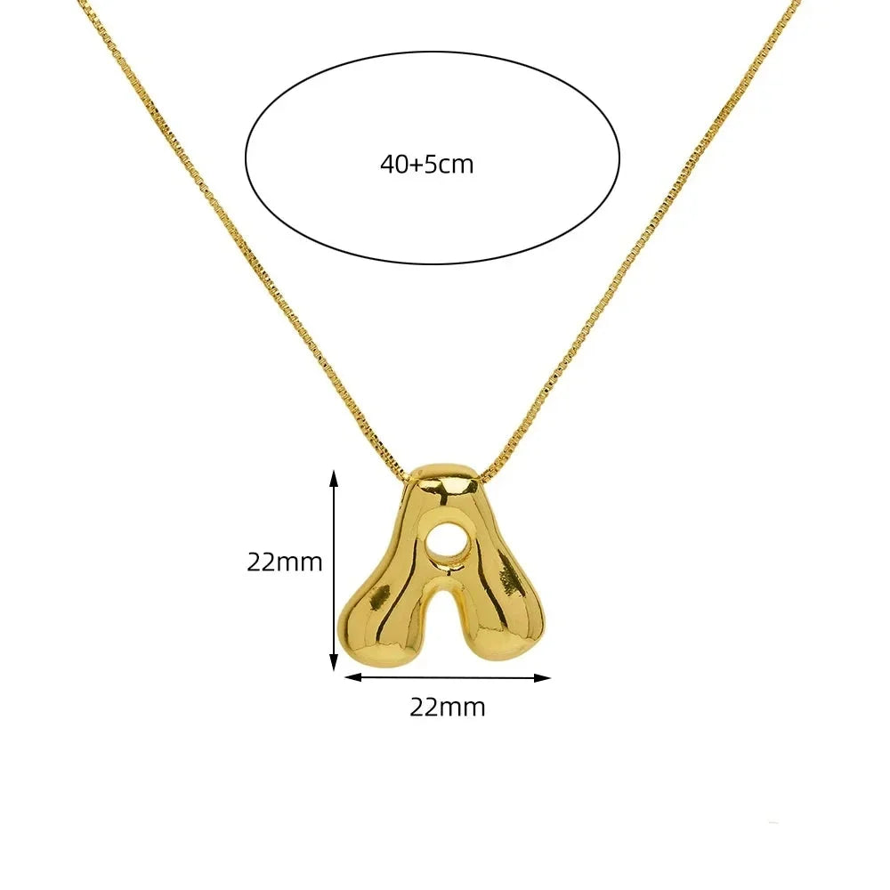 Modern Golden Pop initial pendant necklace for women, a sleek gold-tone stainless steel letter for personalized style.