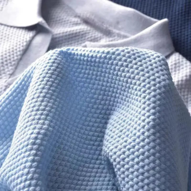 Men's green waffle knit polo, modern fit, great for breathable summer or fall casual style.