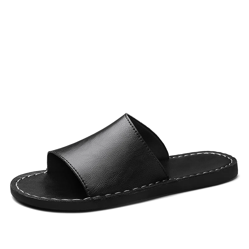 Slip-on men's black summer sandals, cross-strap design for comfortable vacation essentials.