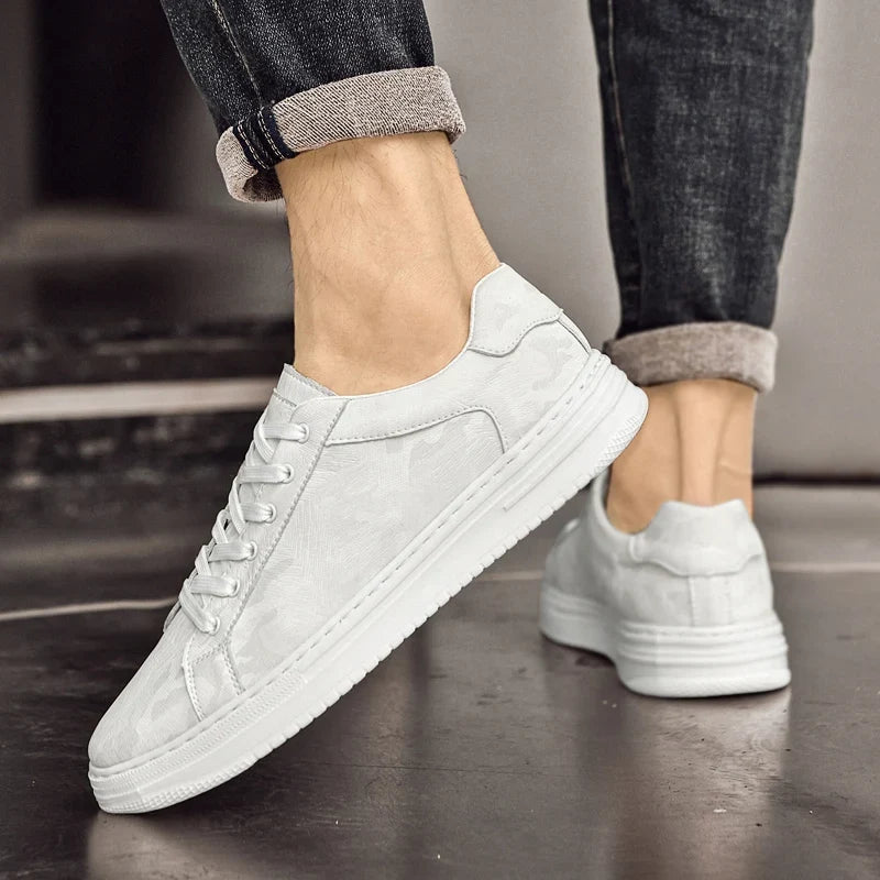 Assorted Men's Canyon Everyday Sneakers, showcasing black, beige, and white color options.