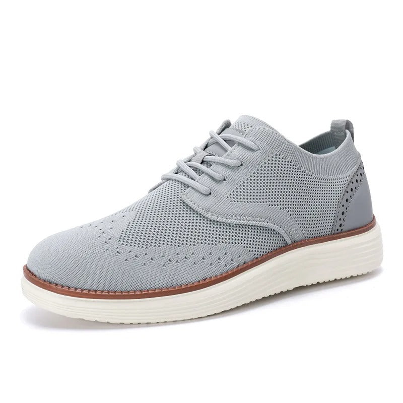 Men's sophisticated wingtip dress sneakers, designed for ultimate comfort and men's fashion.