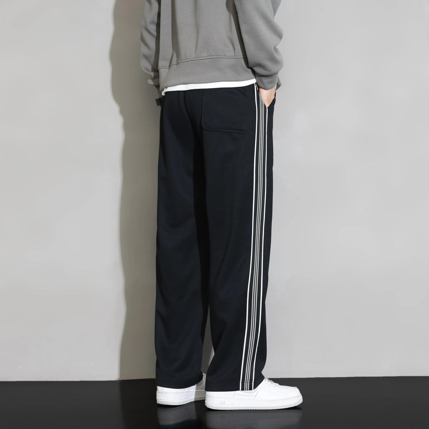 Modern striped men's joggers. Comfortable, stylish pants perfect for activewear, loungewear, or daily casual wear.