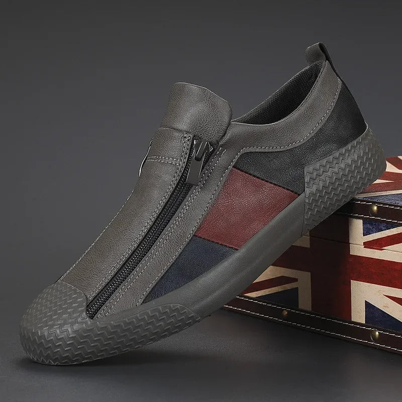Men's genuine leather slip-on sneakers in a stylish design, ideal for casual fashion and all-day comfort.