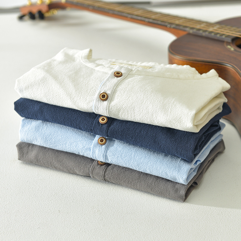 Versatile men's lightweight Henley shirt, a stylish and breathable top perfect for relaxed summer fashion and casual outings.