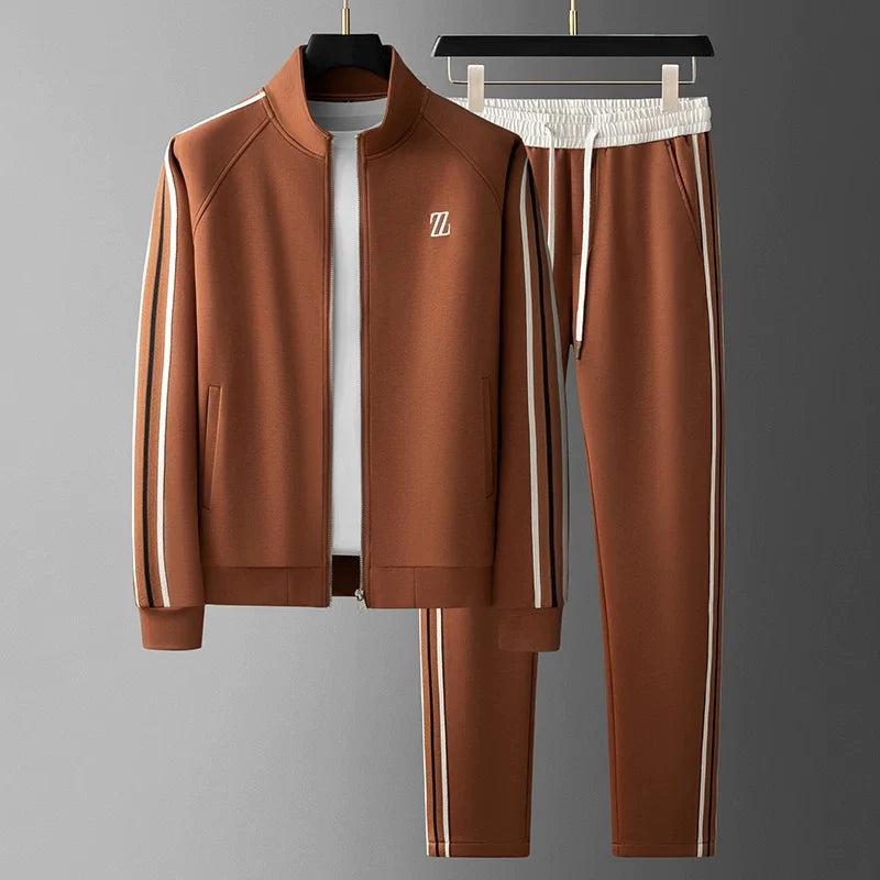 Complete men's Manor tracksuit. Comfortable zip-up jacket & trousers, perfect for stylish loungewear or sportswear.