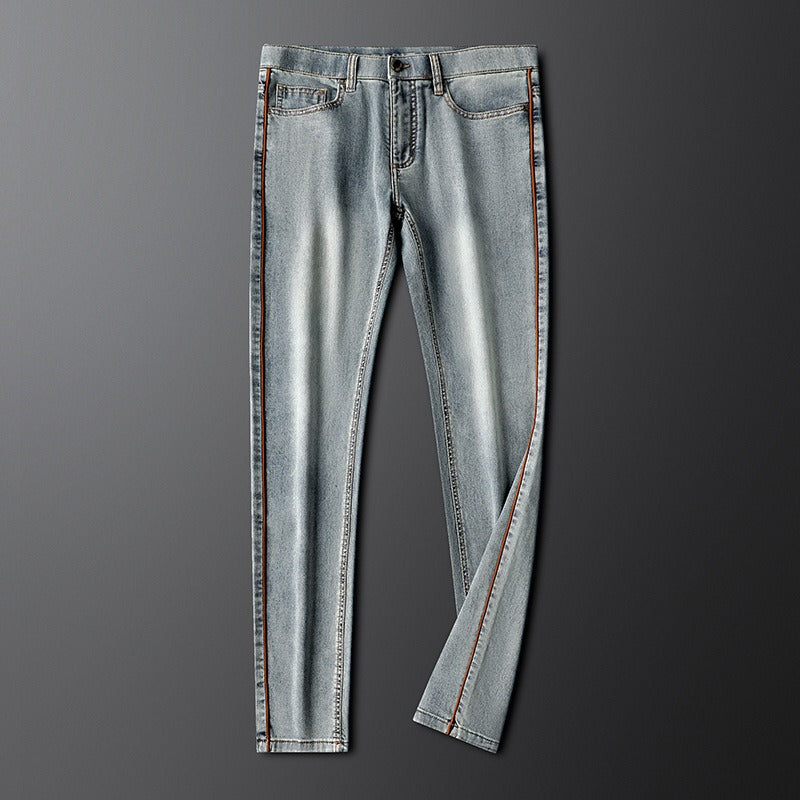 Versatile men's gray stretch slim fit jeans, offering comfort & a modern denim look.