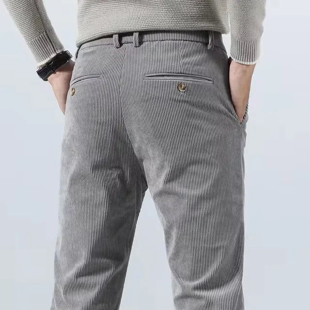 Contemporary men's slim fit tailored pants, offering comfort and a polished look for any event.