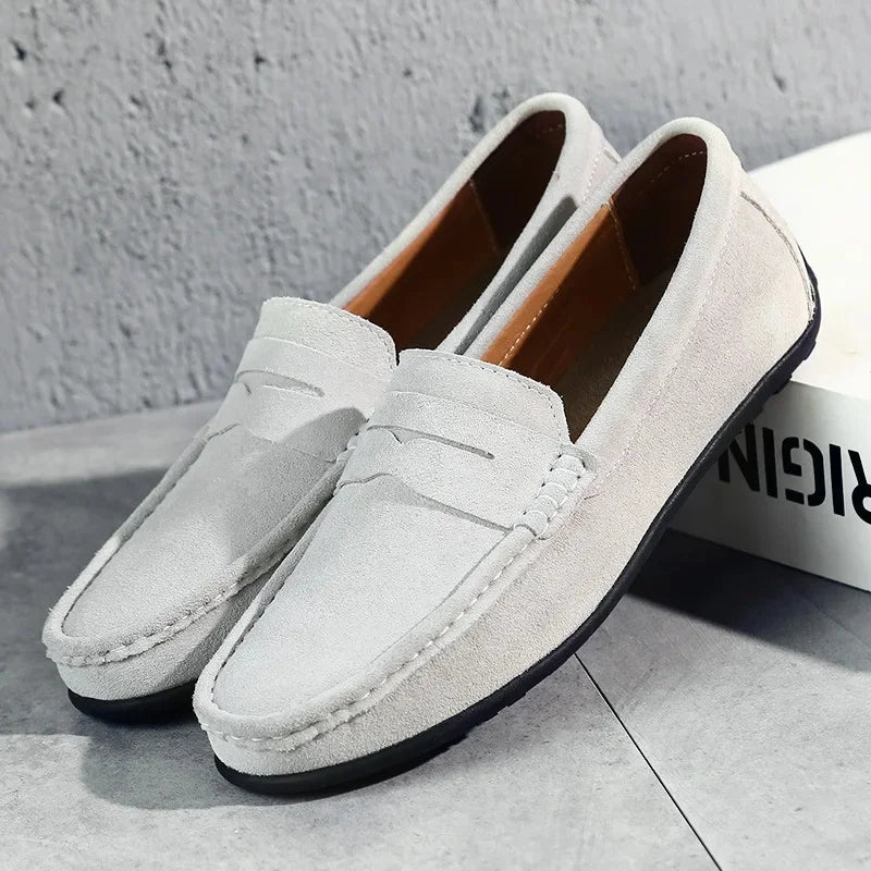 Men's comfortable and stylish black slip-on loafers, versatile for any occasion.