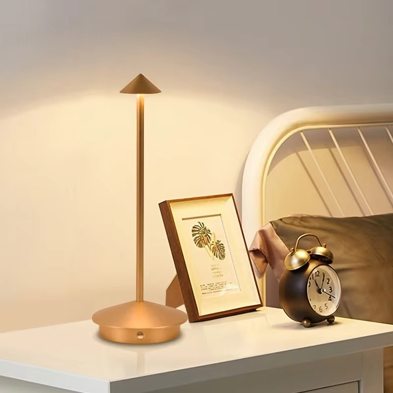 Portable rechargeable LED desk lamp, cordless with touch dimming, provides convenient light for any room.