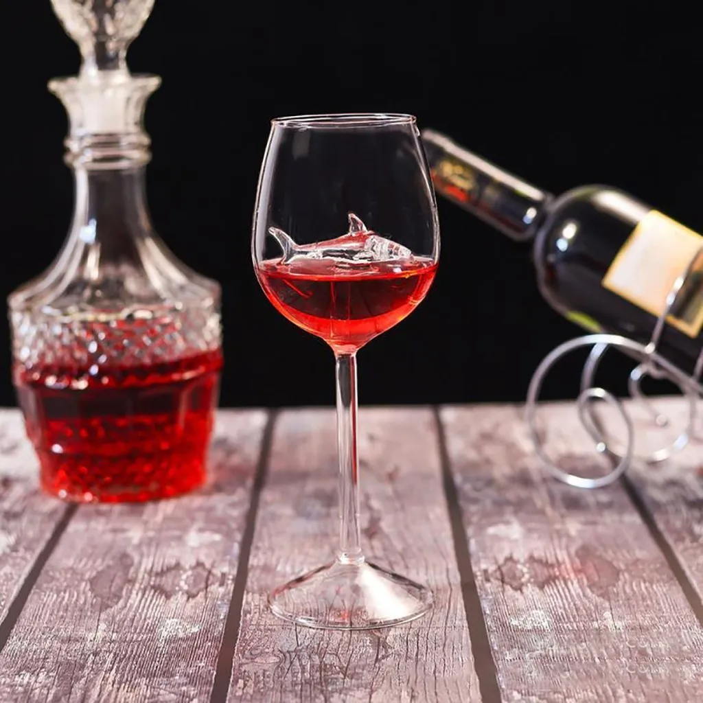 Detailed shark figure visible inside this unique drinking glass. Perfect for home entertaining, parties, and shark fans.