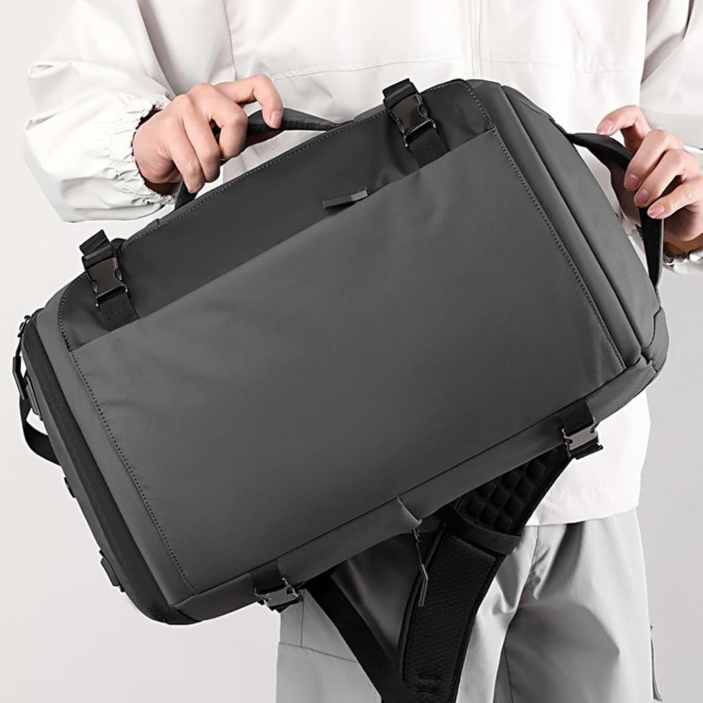 Unisex 15" waterproof laptop backpack, side-open access, USB-C charging for devices on the go.