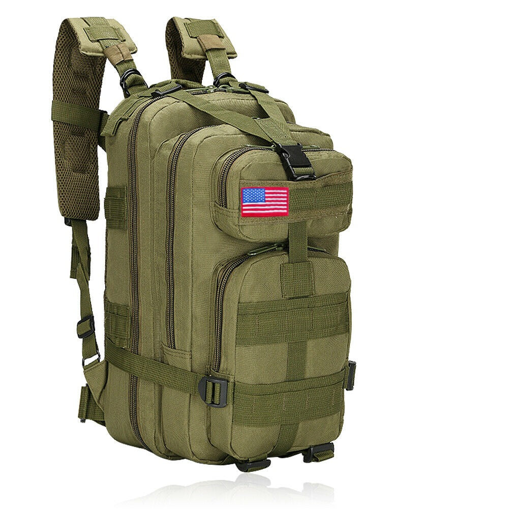 Overhead shot of a packed 30L military camping backpack, showing its capacity for extensive survival gear