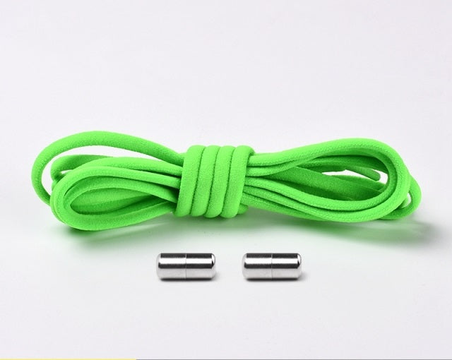 Green elastic shoelaces, a comfortable and convenient no-tie footwear accessory