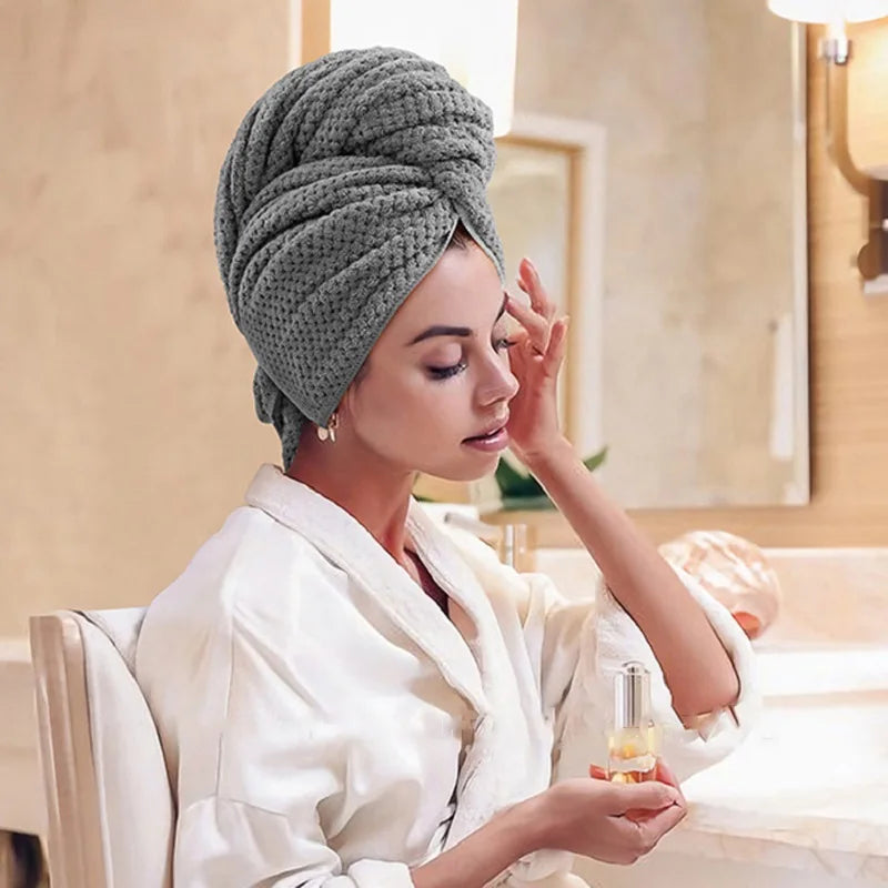 Efficient hair towel wrap, ultra-absorbent microfiber for quick-dry action & guaranteed frizz-free styling.