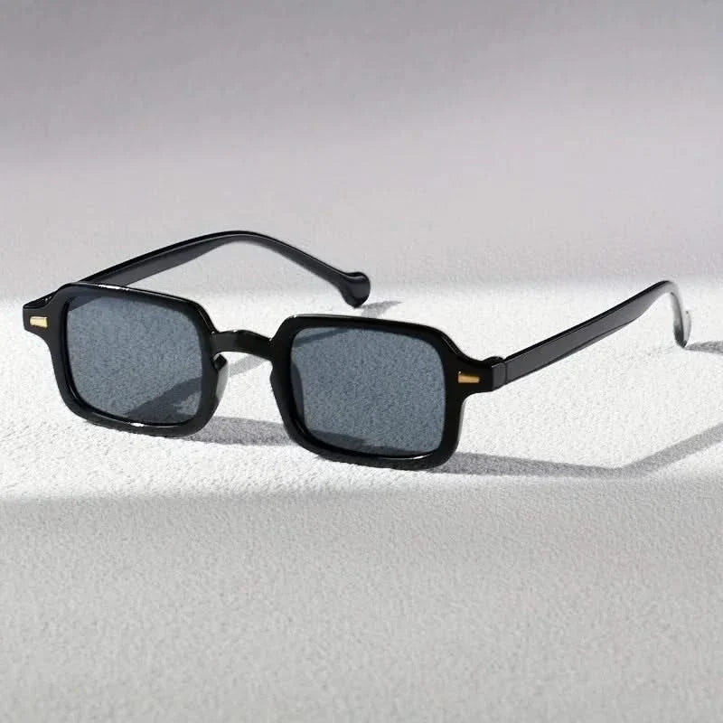Classic retro square sunglasses for men & women. Durable, anti-glare lenses provide clear vision & style.