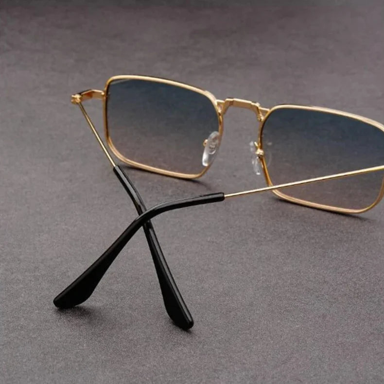 Trendy rectangular shades with a lightweight metal frame, suitable for both men and women, featuring modern design.