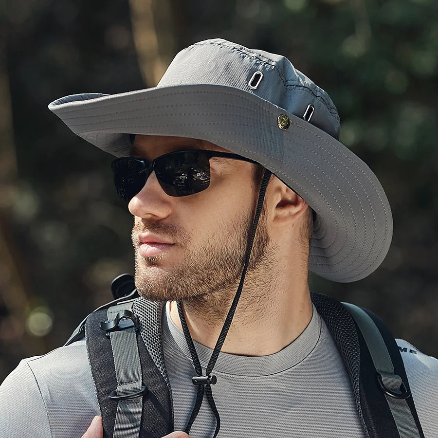 Stylish wide brim sun hat, packable & breathable, ideal for summer outdoor comfort & UV protection.