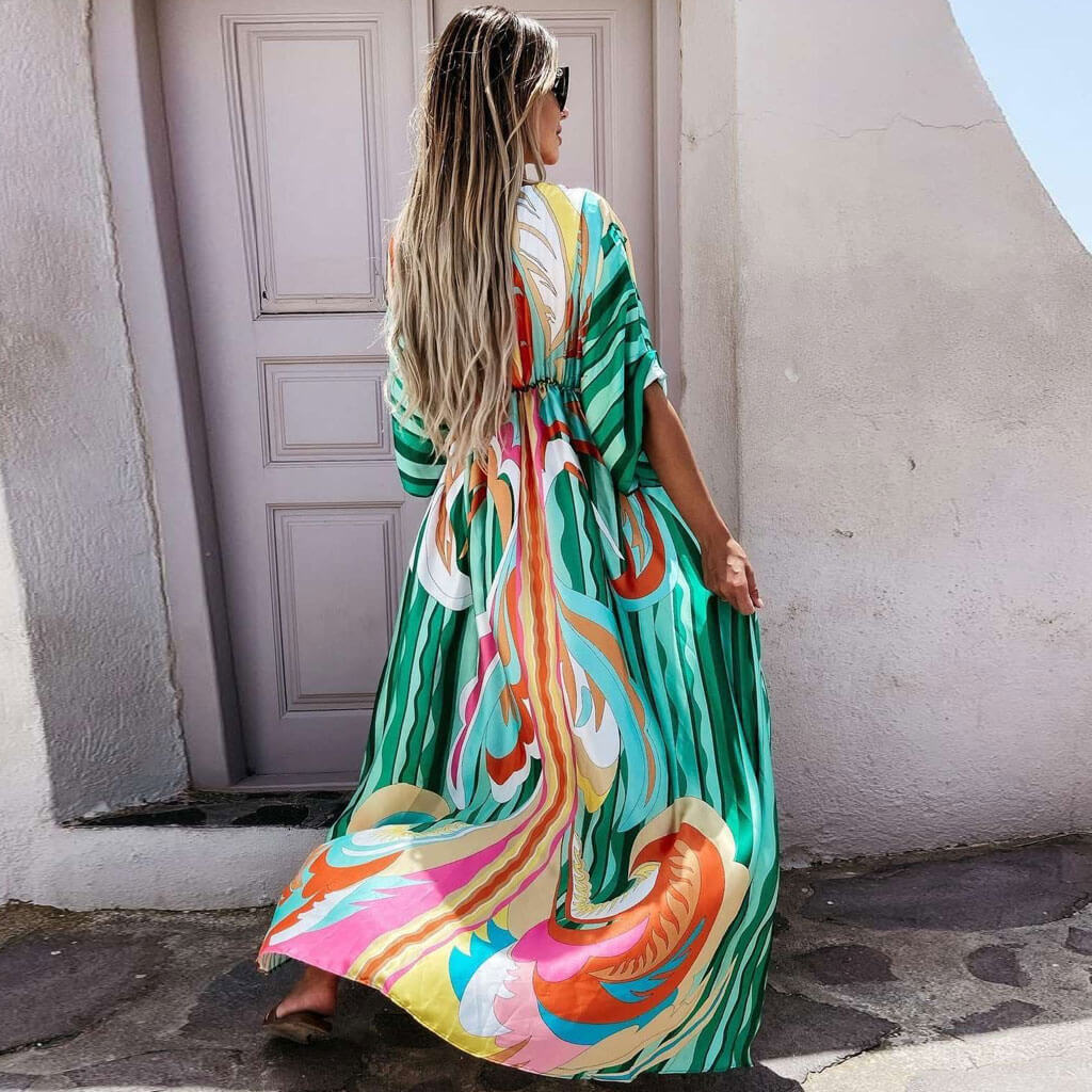 Elegant green abstract print maxi dress for women, vacation ready with a chic, flowy design.
