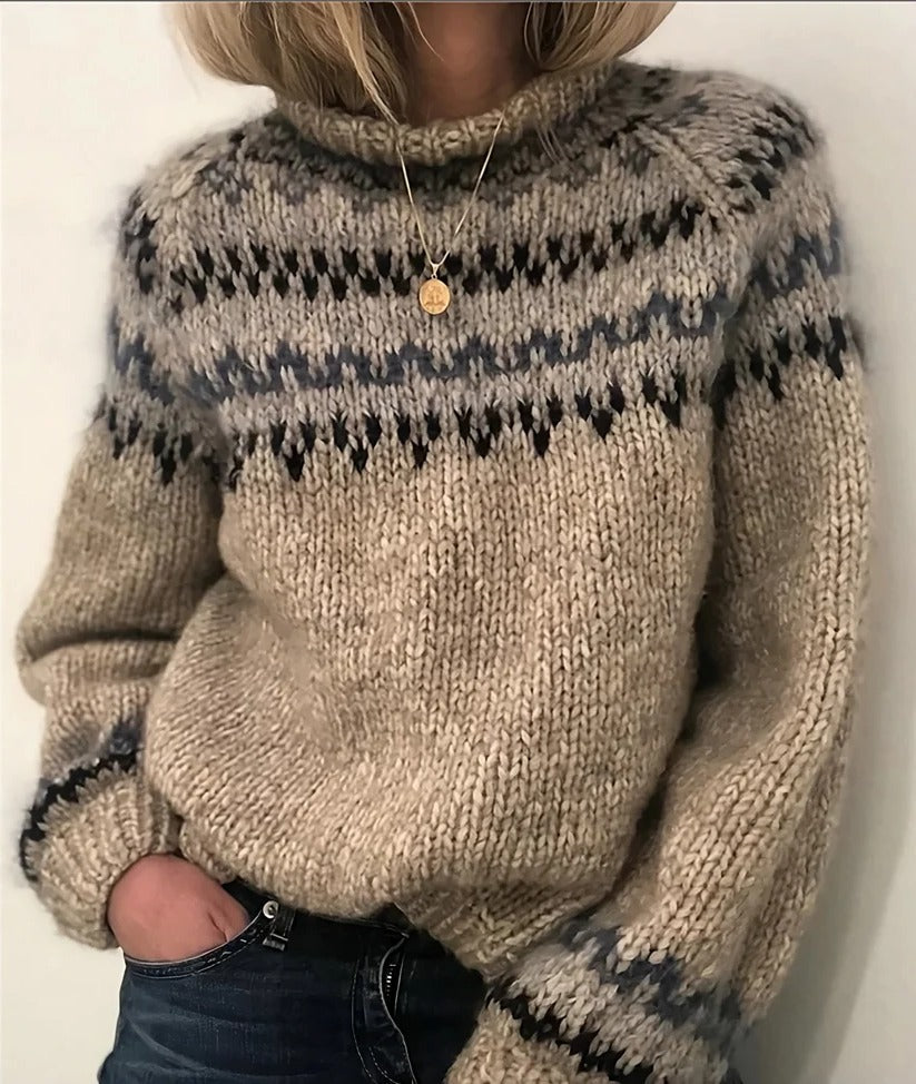 Close-up of a women's classic Icelandic wool turtleneck sweater, showcasing chunky knit for ultimate winter warmth.