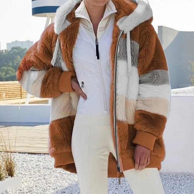 Women's warm plush hooded jacket. Comfortable and stylish winter outerwear, perfect for cozy fashion.