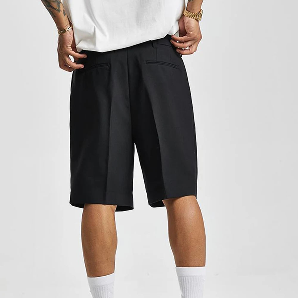 Chic women's pleated shorts with a tailored high-waist. Sophisticated yet comfortable for summer elegance.