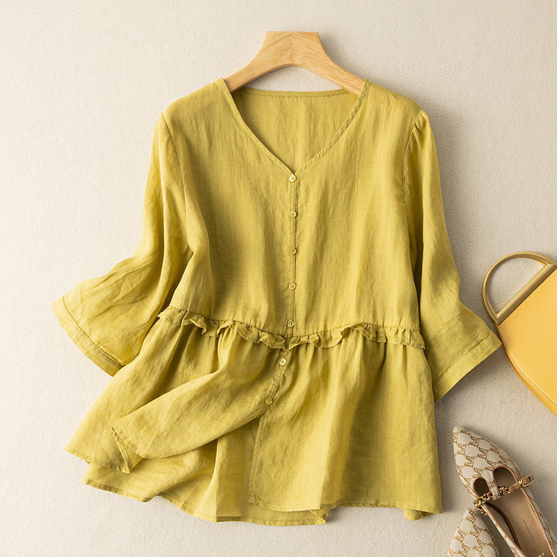 Stylish women's flowy top with 3/4 sleeves, button-up design. This elegant blouse offers comfort & versatile wear.