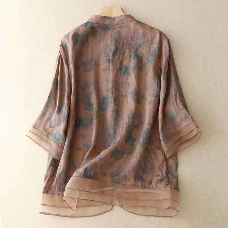 Stylish women's floral shirt, a flowy and elegant blouse offering comfortable and versatile wear.