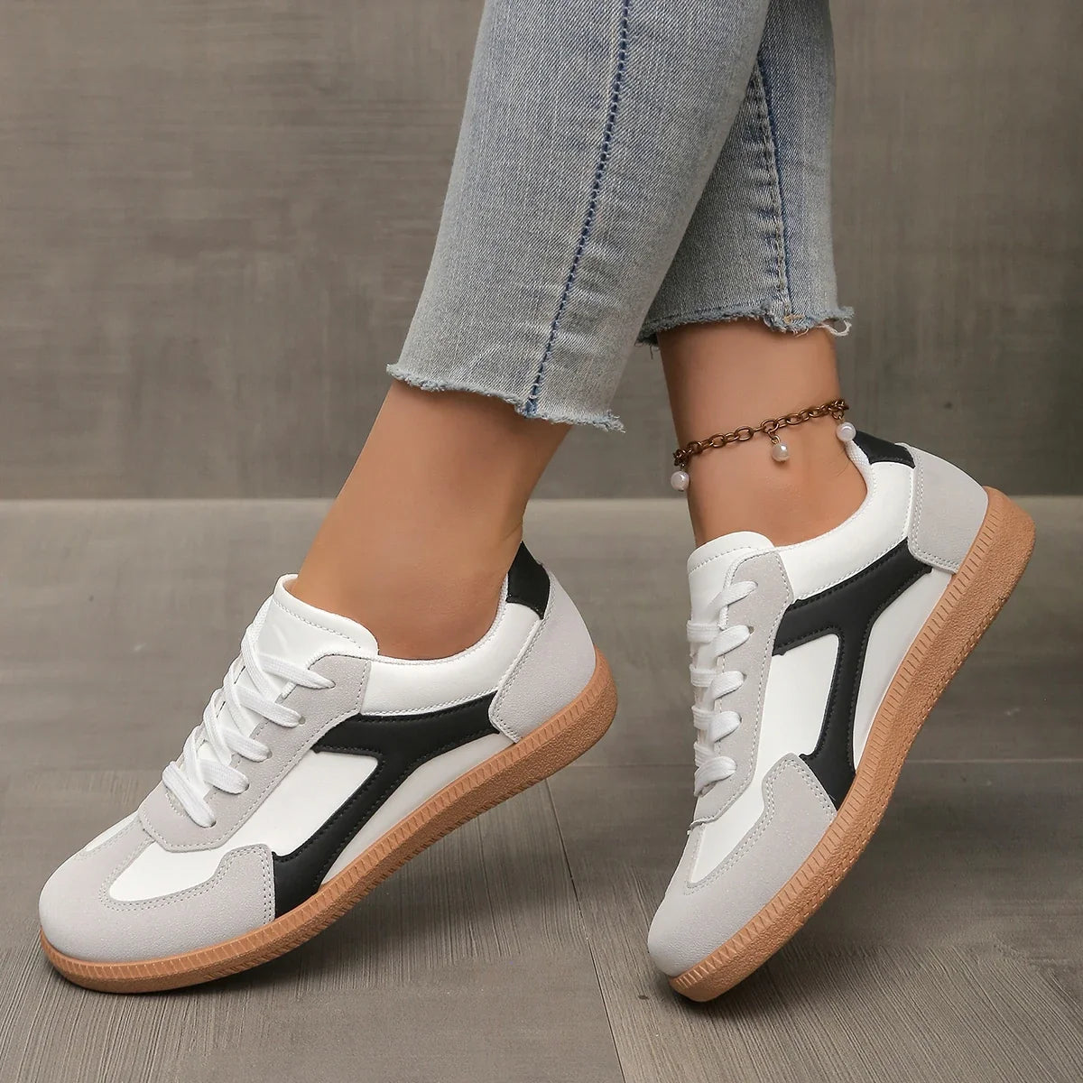 Stylish Livia vintage-inspired women's sneakers. Retro low-profile casual footwear, perfect for a comfortable lifestyle.