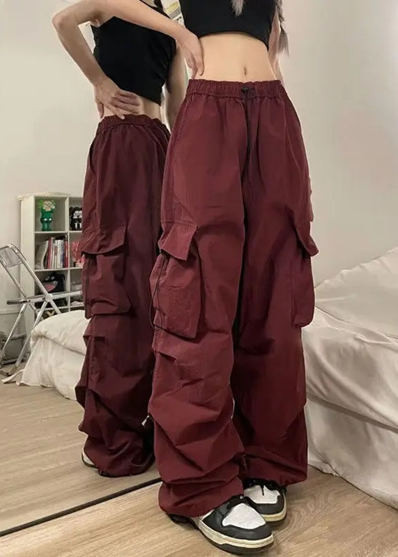 Metropolitan women's cargo pants, oversized wide leg, comfortable, with utility pockets for urban streetwear.