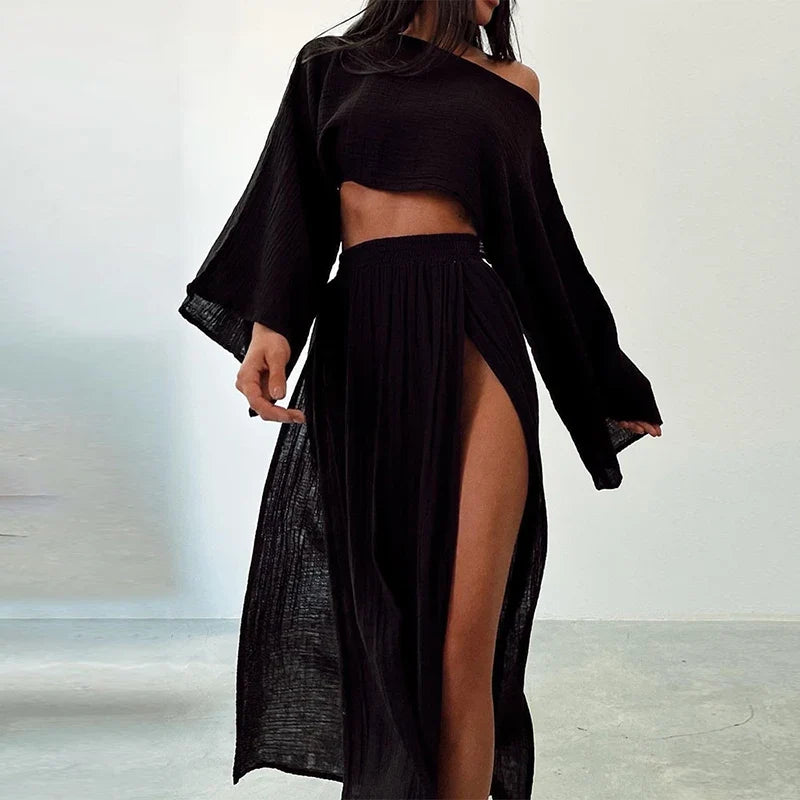 Versatile women's linen blend two-piece set: a relaxed fit cropped top & high-slit skirt for warm summer days.