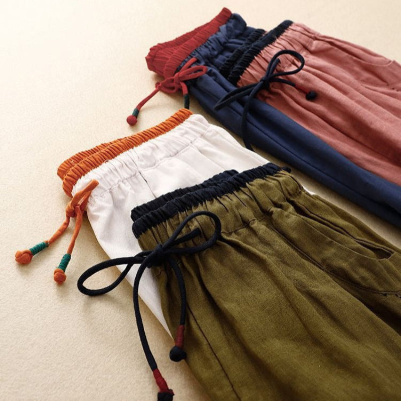 Effortless women's summer trousers, relaxed wide-leg fit for airy comfort & casual style. High-waisted pants.