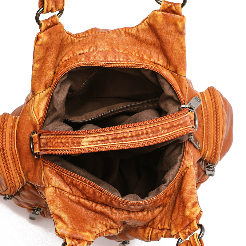 Chic faux leather women's shoulder bag, also works as a crossbody. Stylish & practical handbag.