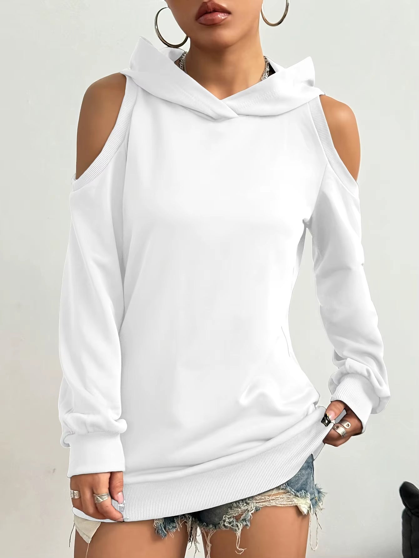 Stylish red women's off-shoulder sweatshirt, a comfortable cutout top perfect for modern casual wear.