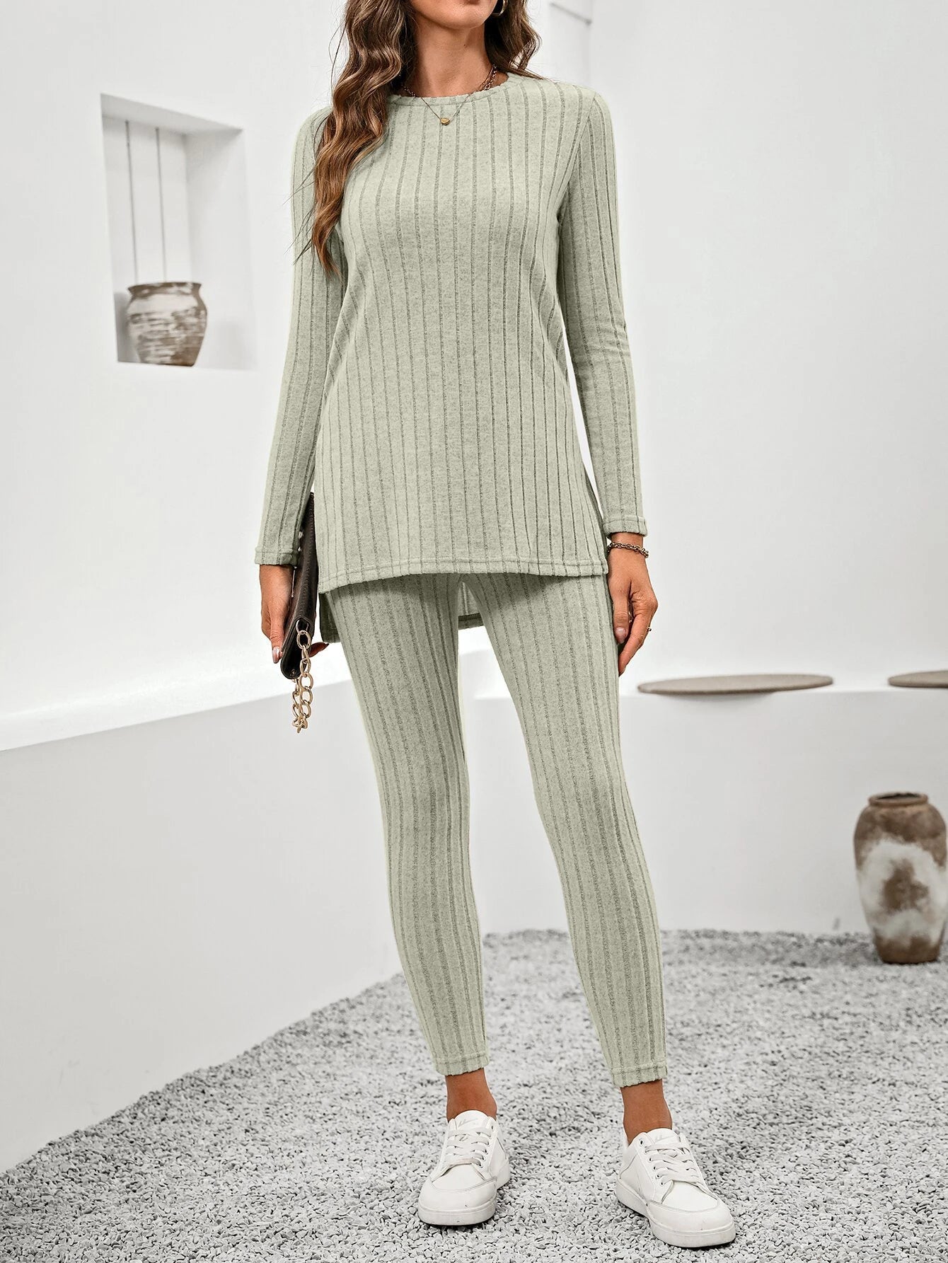 Chic women's versatile two-piece set for casual elegance, including a comfy tunic and soft leggings.