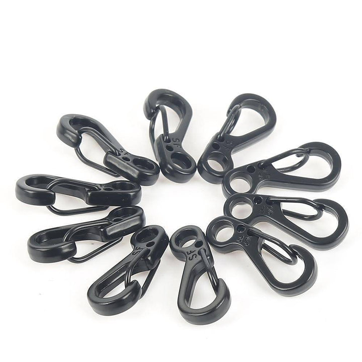 Display of 10 mini SF spring clasps, metallic silver, suitable for various outdoor and tactical needs