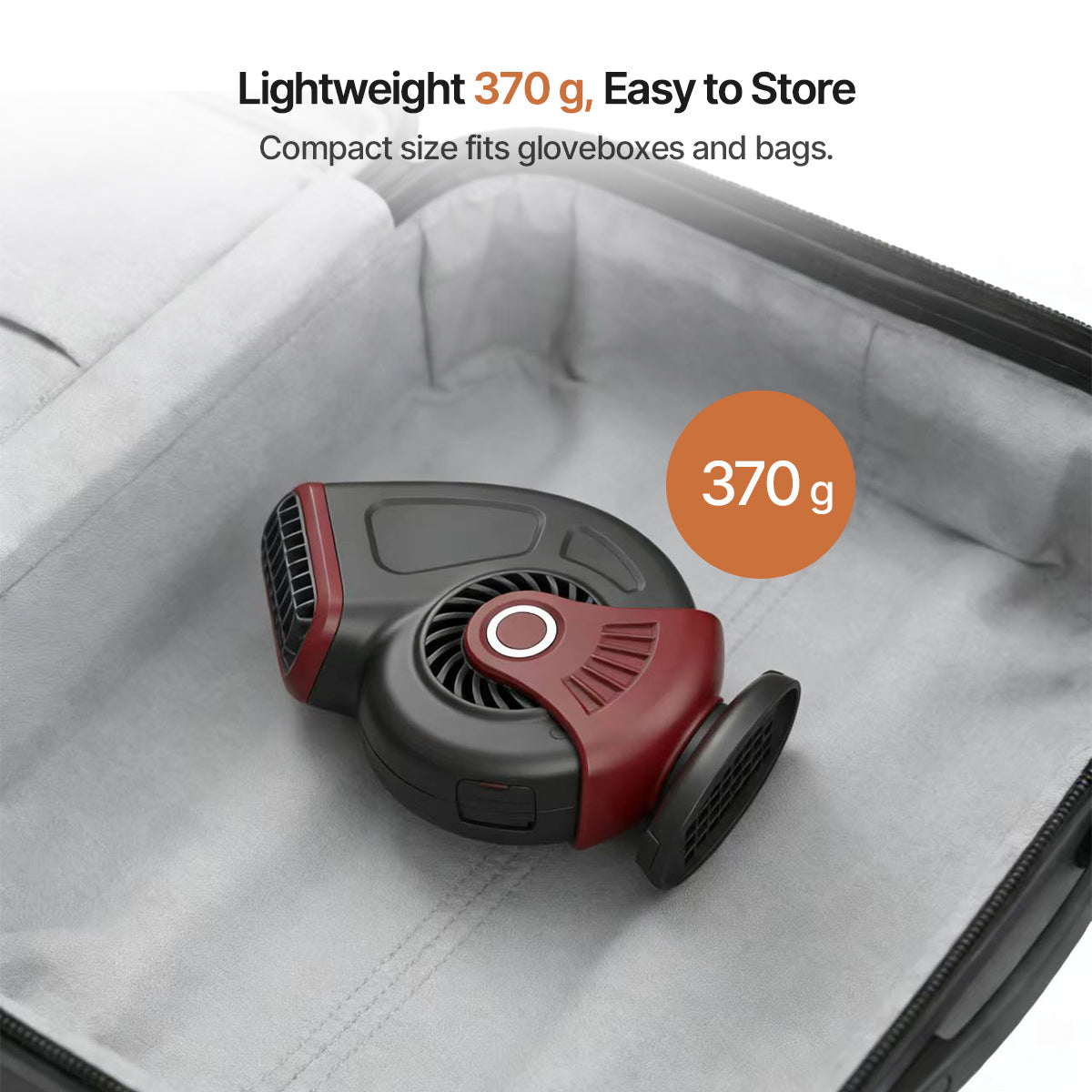 Hand holding a compact 12V vehicle heater, demonstrating its portability for winter driving