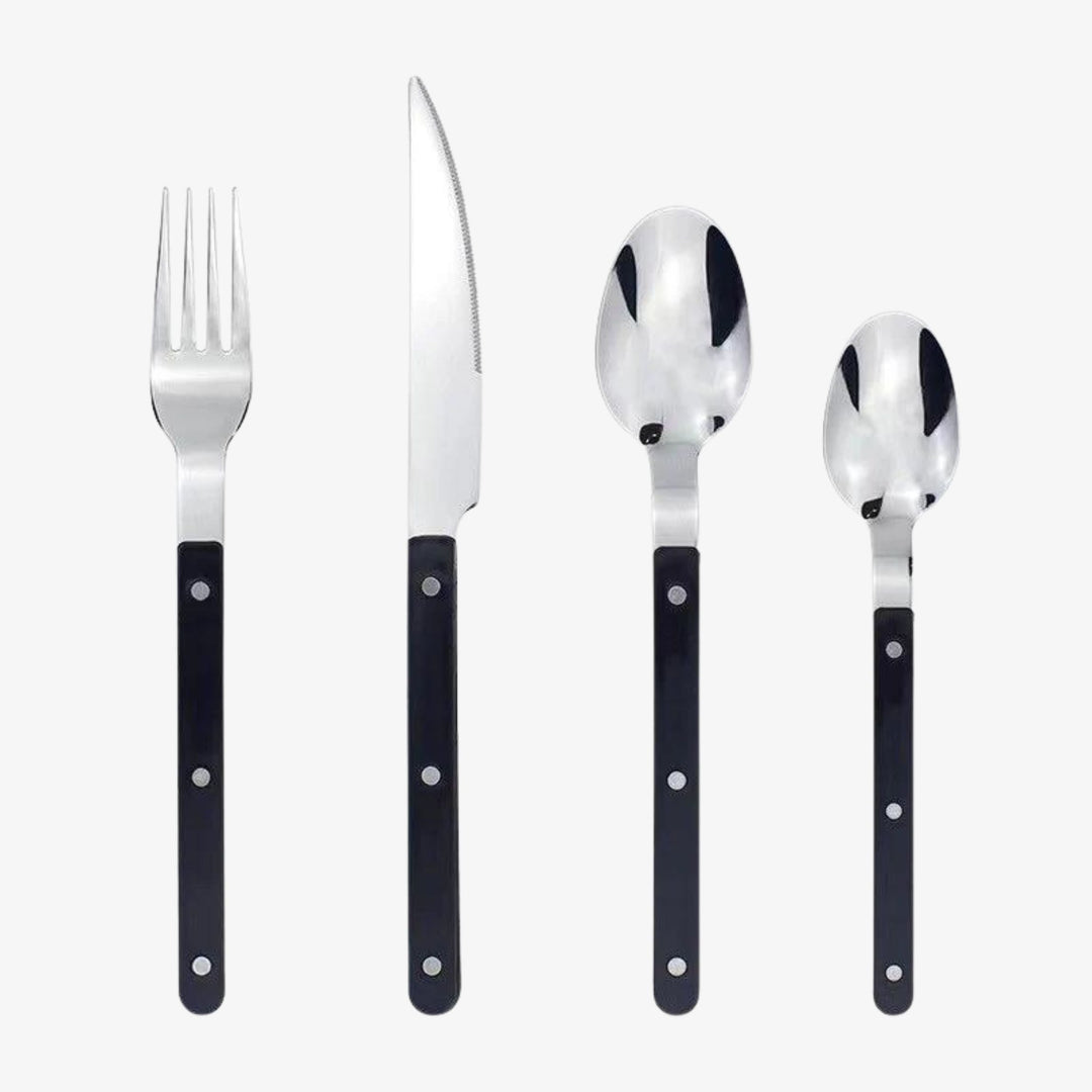 24-piece stainless steel cutlery set with elegant engraved design. Perfect for dining & table settings.