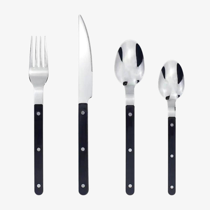 24-piece stainless steel cutlery set with elegant engraved design. Perfect for dining & table settings.