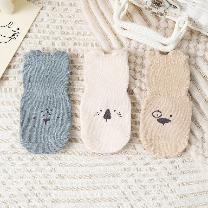 3-pack anti-slip baby socks with rubber grips for safe crawling & walking, ideal for infants & toddlers.