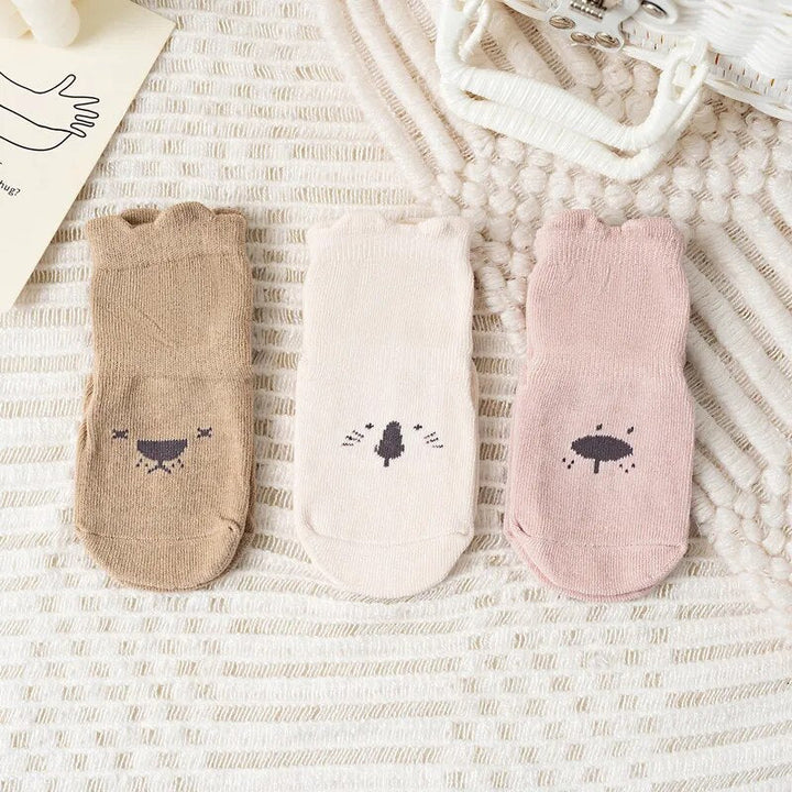 Unisex baby anti-slip socks with strong rubber grips, 3-pack for active toddlers & secure playtime.